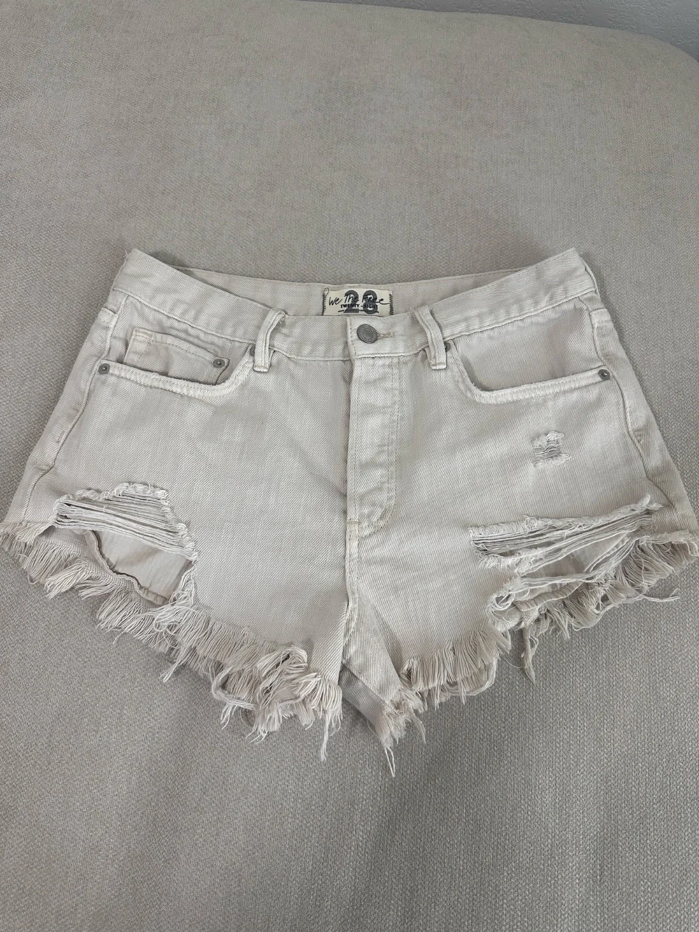 Free People Cream Distressed Denim Cutoff Shorts
